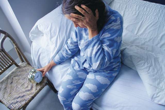 Image showing elderly person struggling to sleep